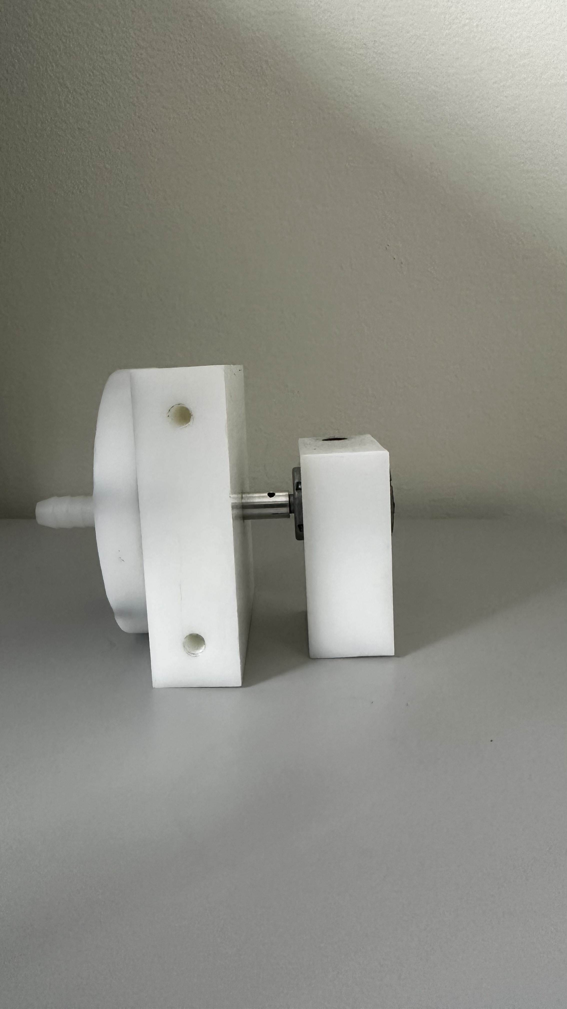 Side view showing the housing depth and shaft side assembly.